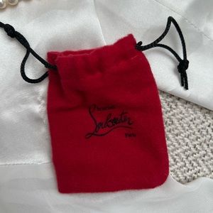 Tiny Christian Louboutin duster